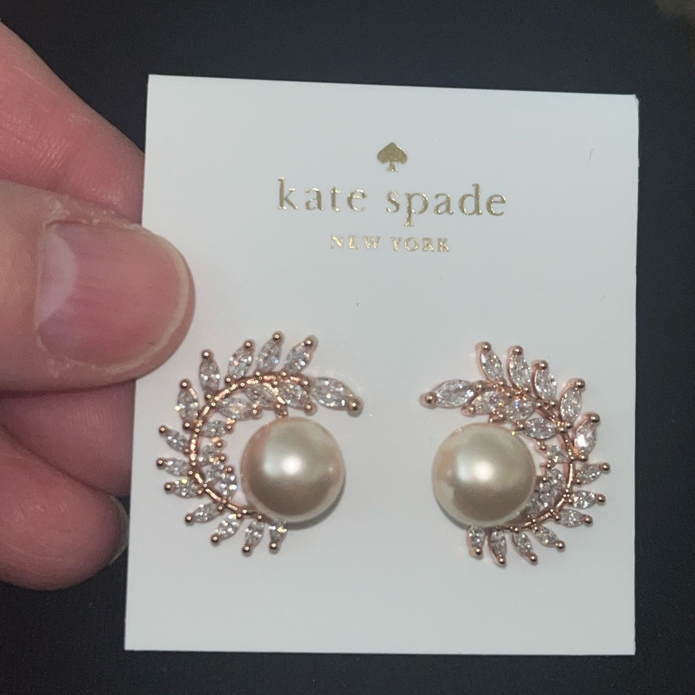 New Kate spade Pearl earrings 
Surrounded by swarovski elements
